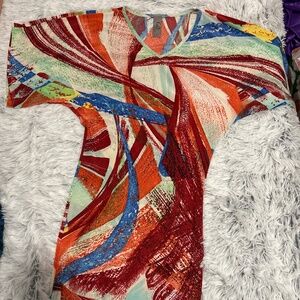 Vibrant colorful dress with a slim fit by Go Couture